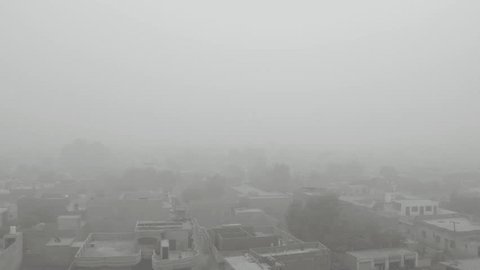 Smog over a Punjab city skyline during winter smog season