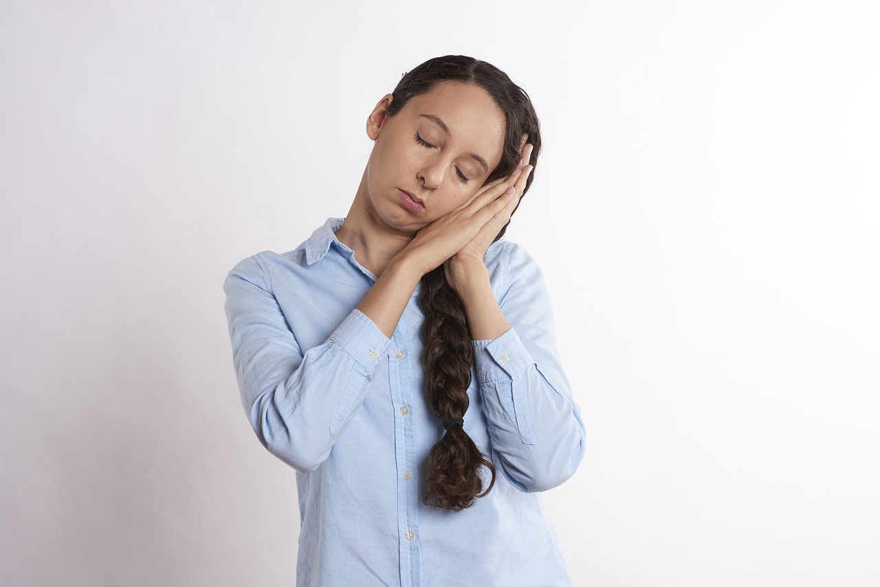 Dark Circles Under the Eyes (Aankhon ke Neeche Halqe): Causes and Treatment 1 Tired young woman with dark circles under the eyes